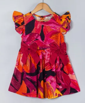 Bold print dress with bows at front waist sides-Burnt orange